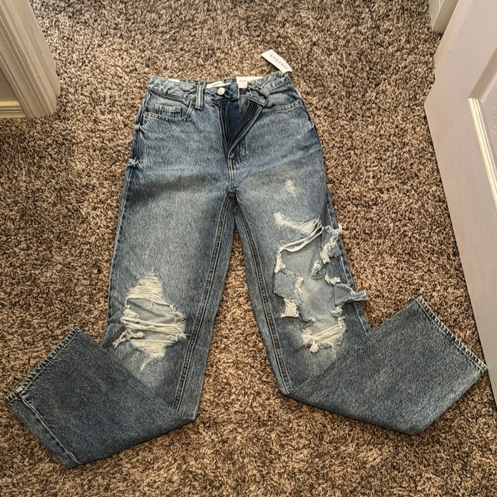 Distressed Blue Jeans